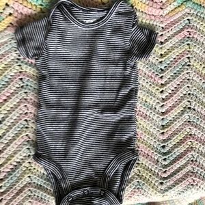Gender neutral black and white striped onesie